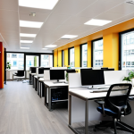 **Prompt:** Interior of a modern commercial space in Hamburg-Eppendorf, Germany. Focus on bright, renovated offices, showcasing value enhancement through modernization. Include German professionals working collaboratively.